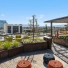 Large roof top deck with covered seating a a nice city view